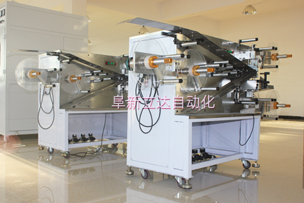 氣動控制張力卷繞機用于啟動電容器的生產(chǎn)中。